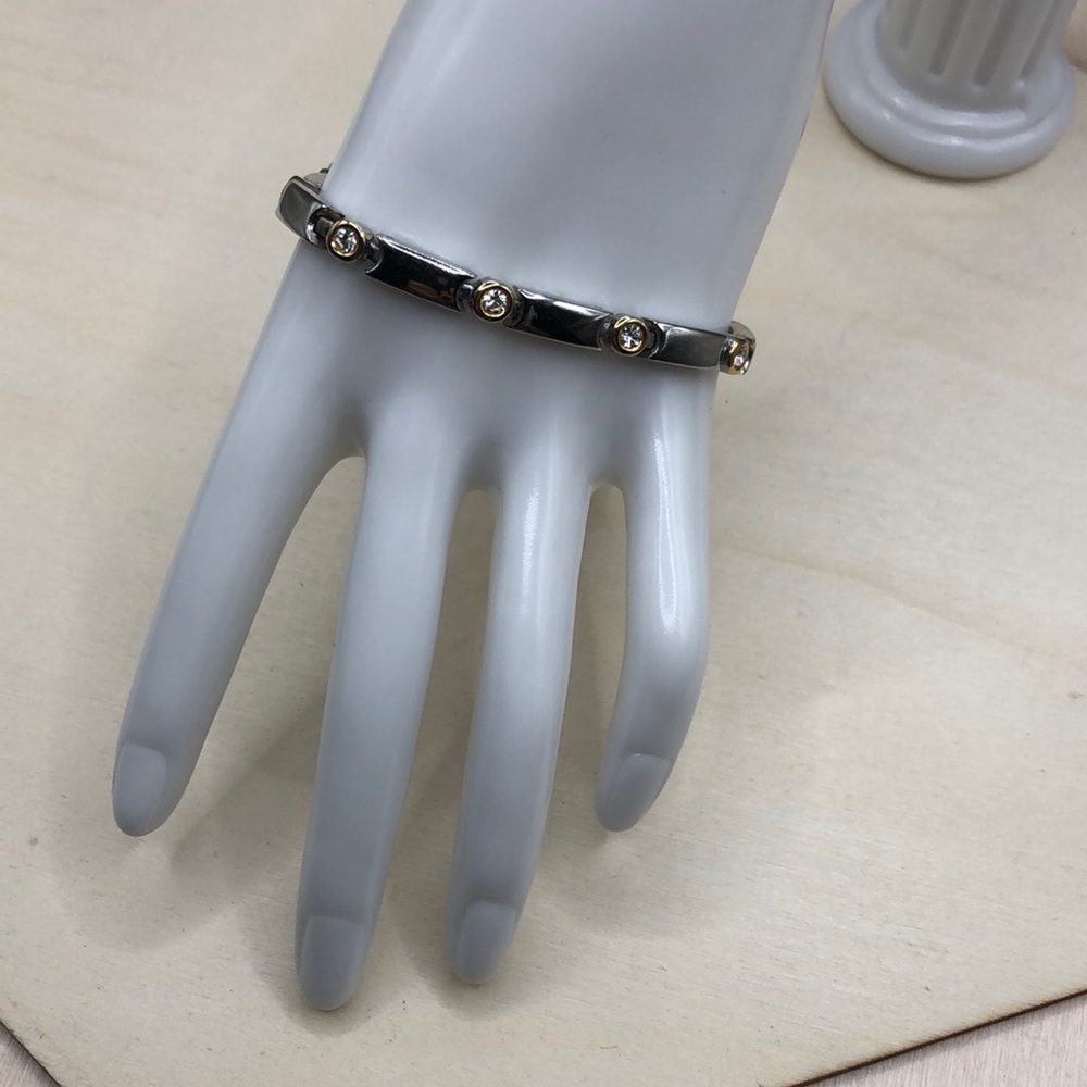 Manhattan silver tone metal tennis style lined bracelet, classic, timeless.